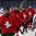 ST. CATHARINES, CANADA - JANUARY 12: Switzerland's Jessica Schlegel #21, Rahel Enzler #22 and teammates skates to the bench after a first period goal against France during relegation round action at the 2016 IIHF Ice Hockey U18 Women's World Championship. (Photo by Jana Chytilova/HHOF-IIHF Images)


